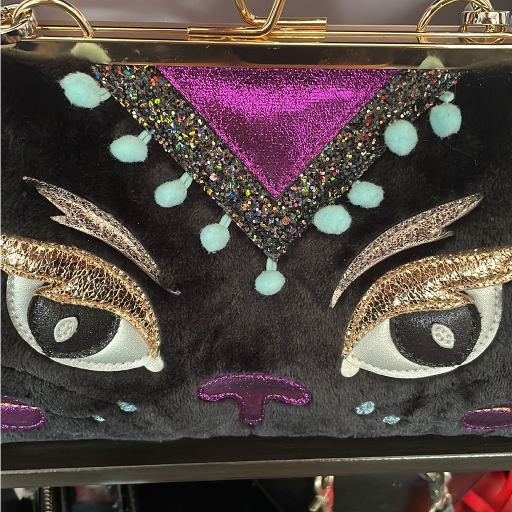 Irregular Choice Black Plush Cat Face Crossbody with Purple and Teal Accents - Picture 2 of 3